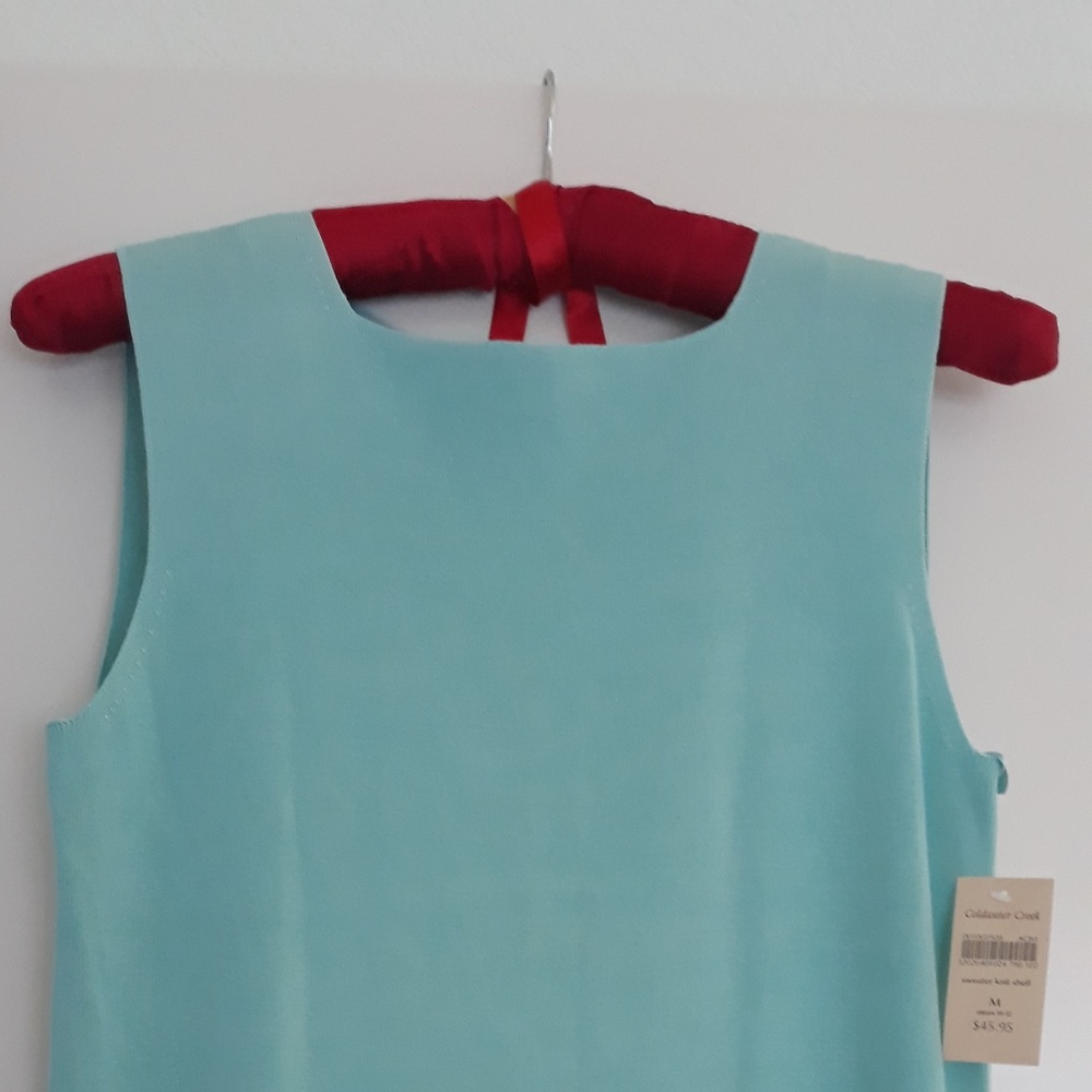 Turquoise top.  Tag still on!